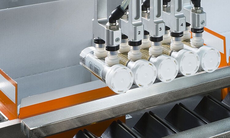 Pick and Place of rigid tubes into cartons - Promatic cartoner