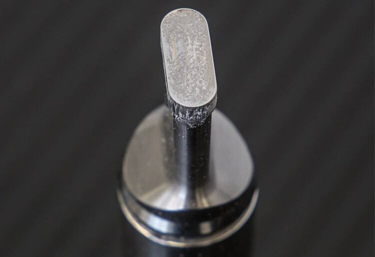 Tableting powder sticks on punch tip